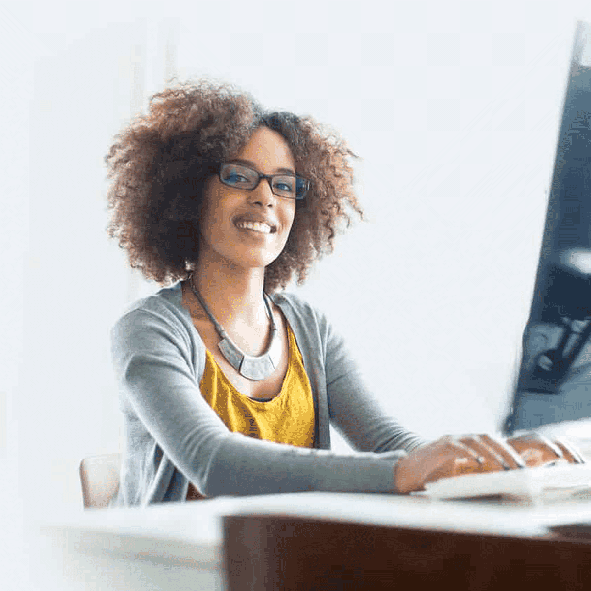 woman typing on keyboard