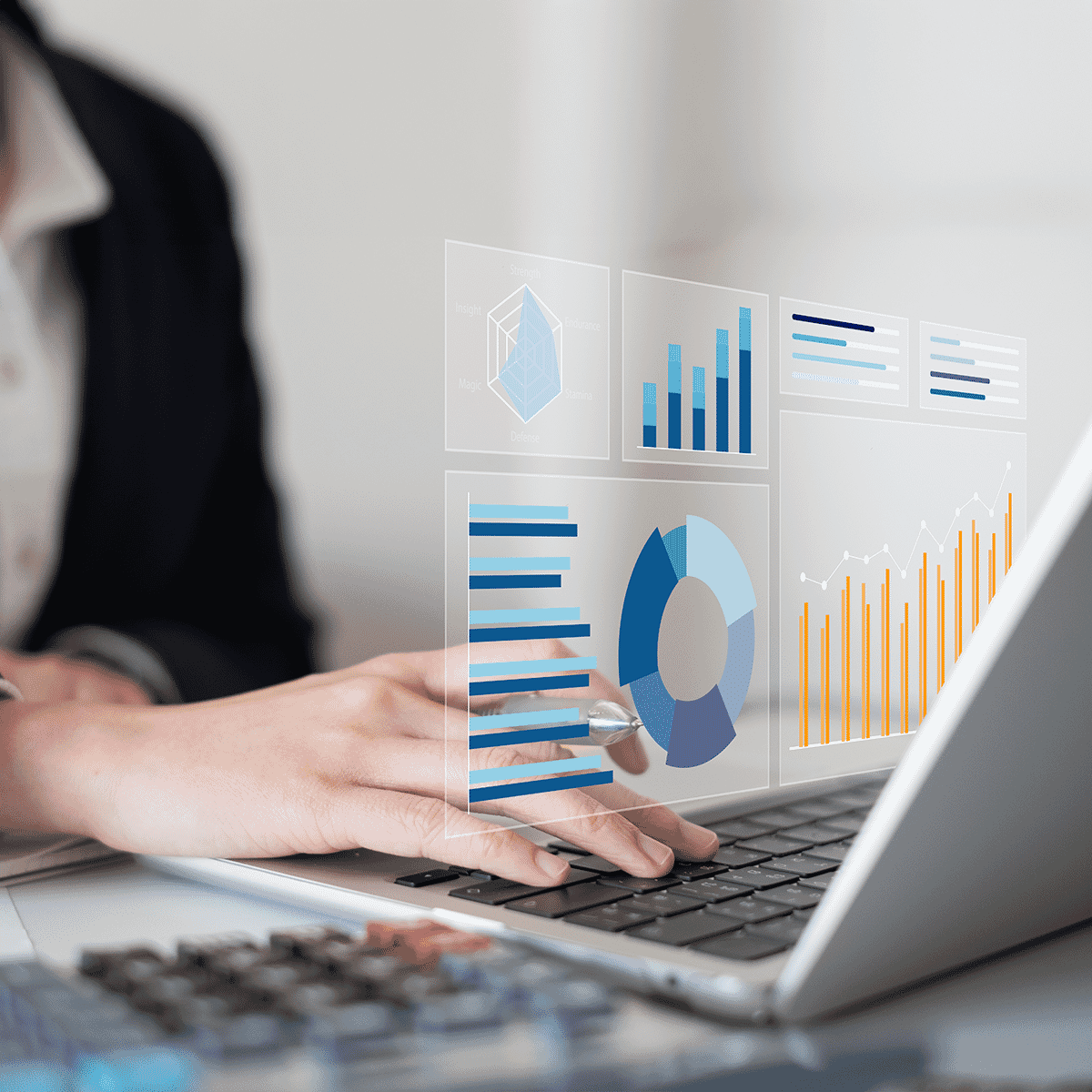 typing on laptop with graphic overlay of chart