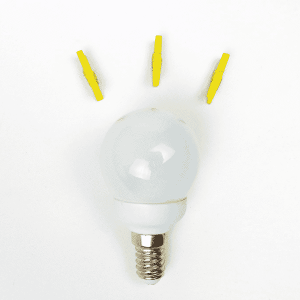 light bulb with yellow clothes pins above it