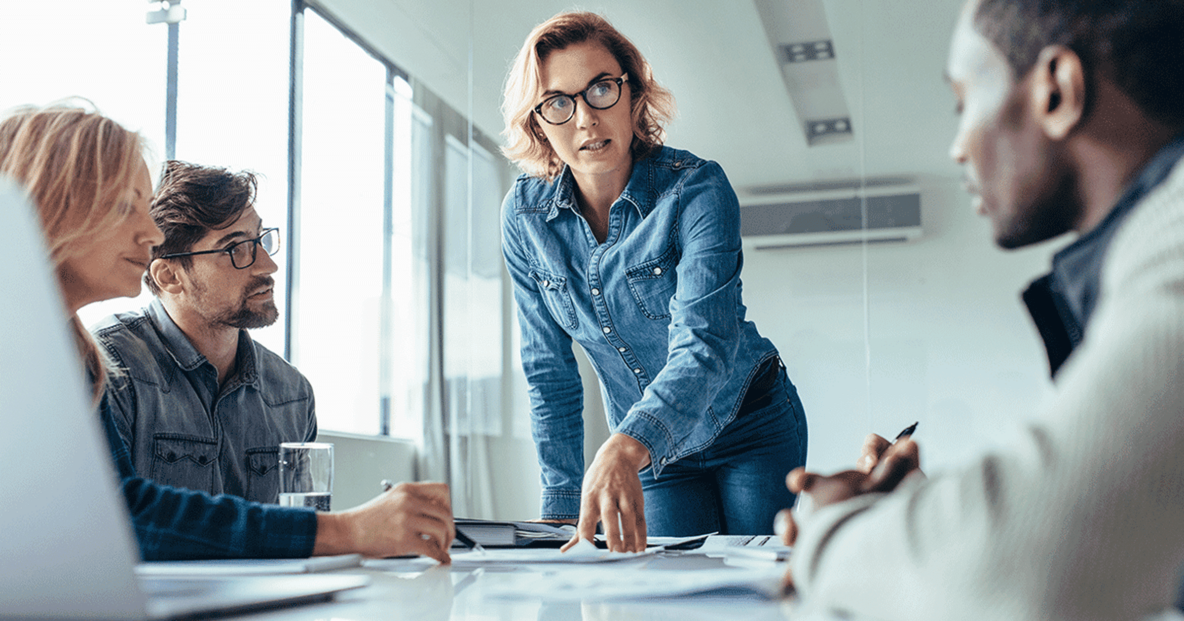 Woman presenting at meeting