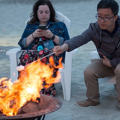 Photo of bonfires and s’mores on the beach