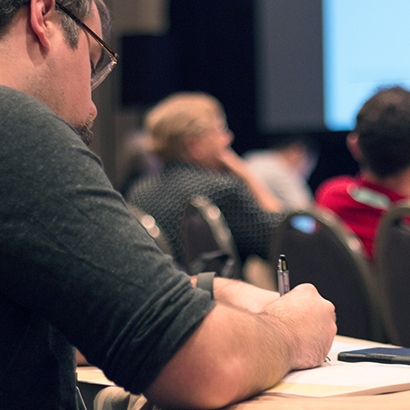 Taking notes at a presentation