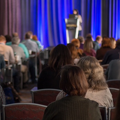 Attendees at a MadWorld presentation