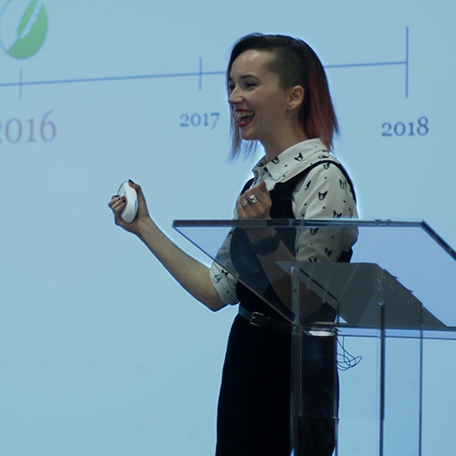 A photo of a MadWorld Presenter smiling during a session