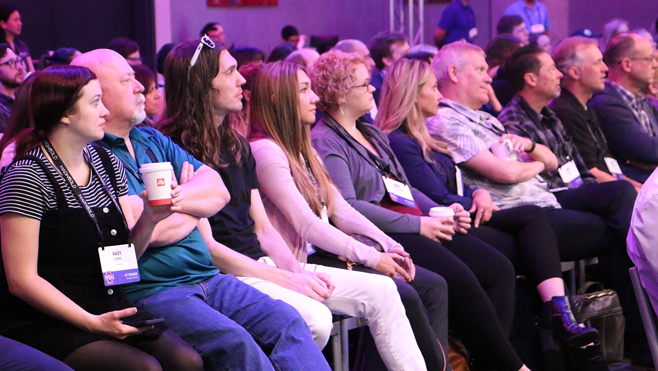MadWorld Conference attendees at session