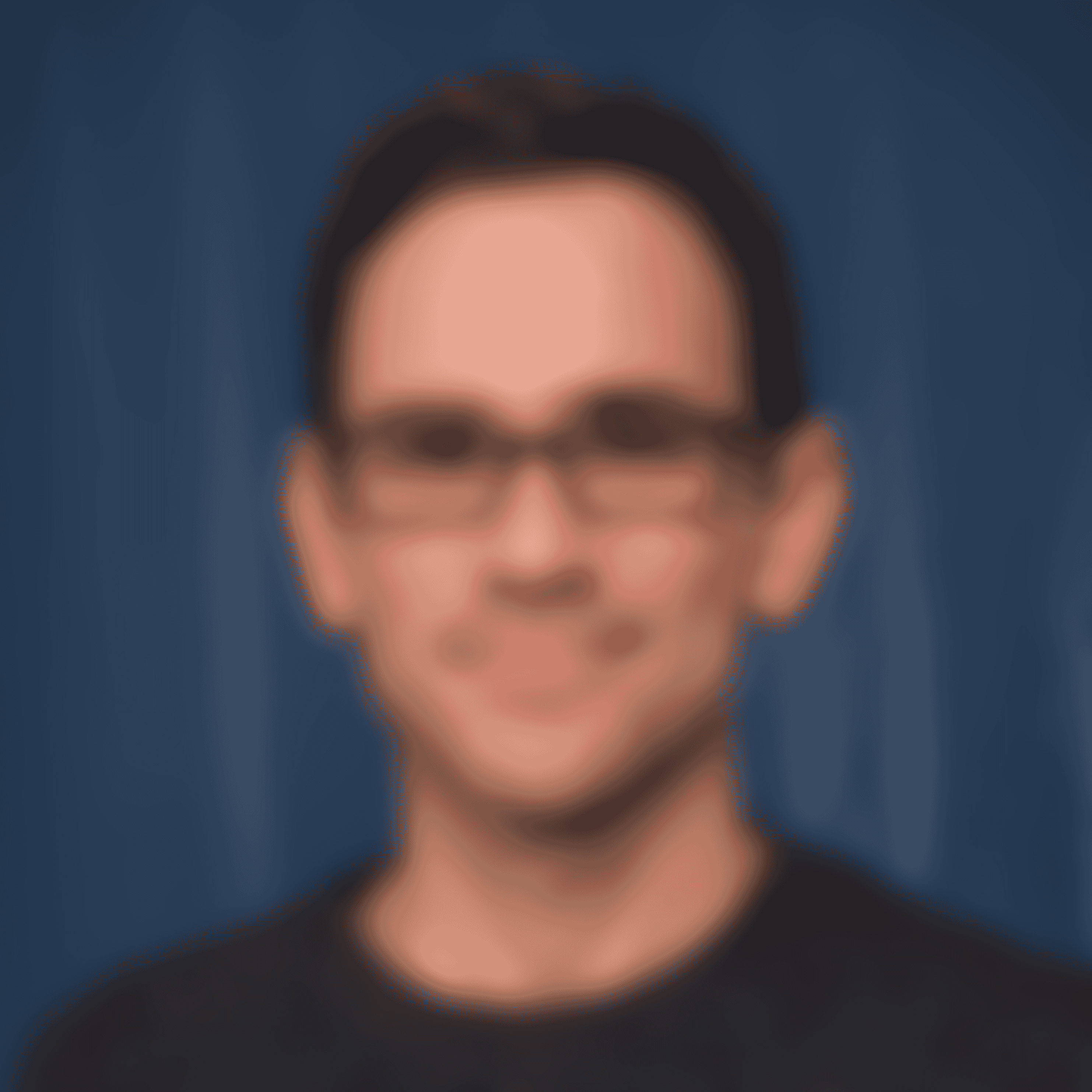 headshot of Chris Kocher in a grey sweater