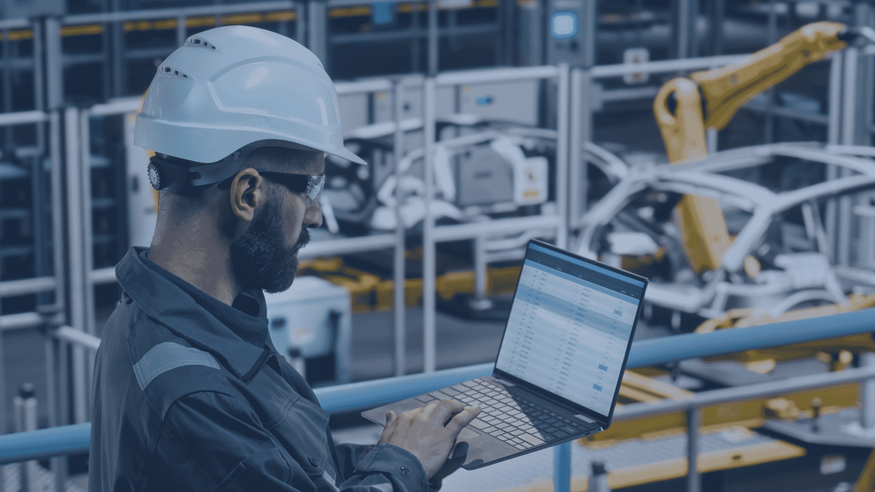 worker typing on laptop