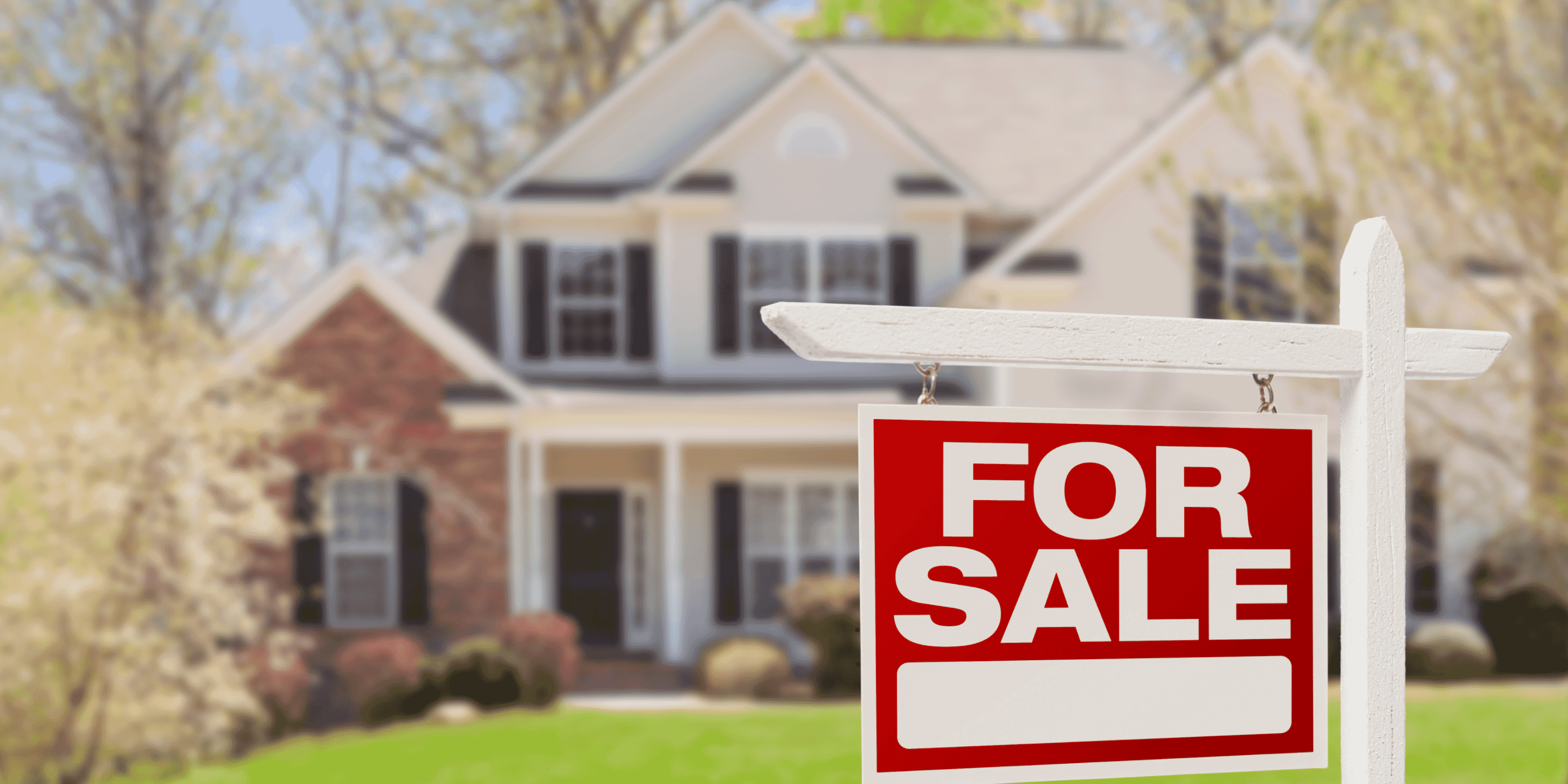 house with for sale sign