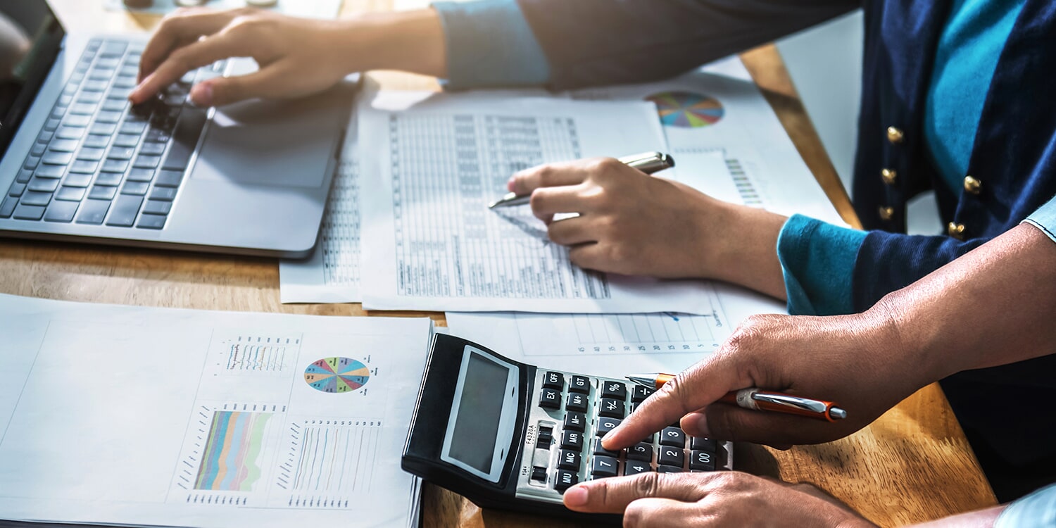 Closeup of people's hands during a meeting