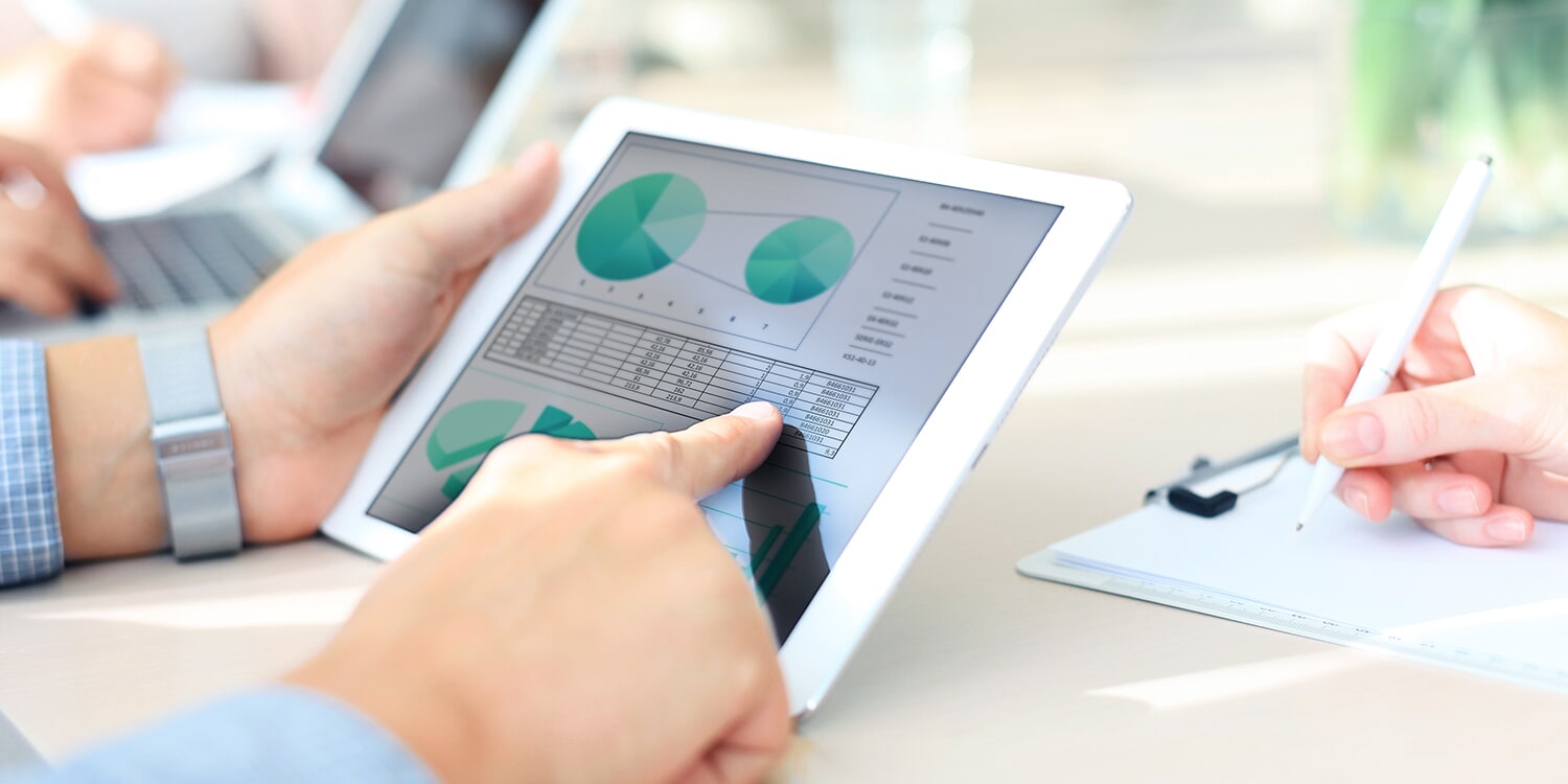 Photo of someone browsing stats on a tablet