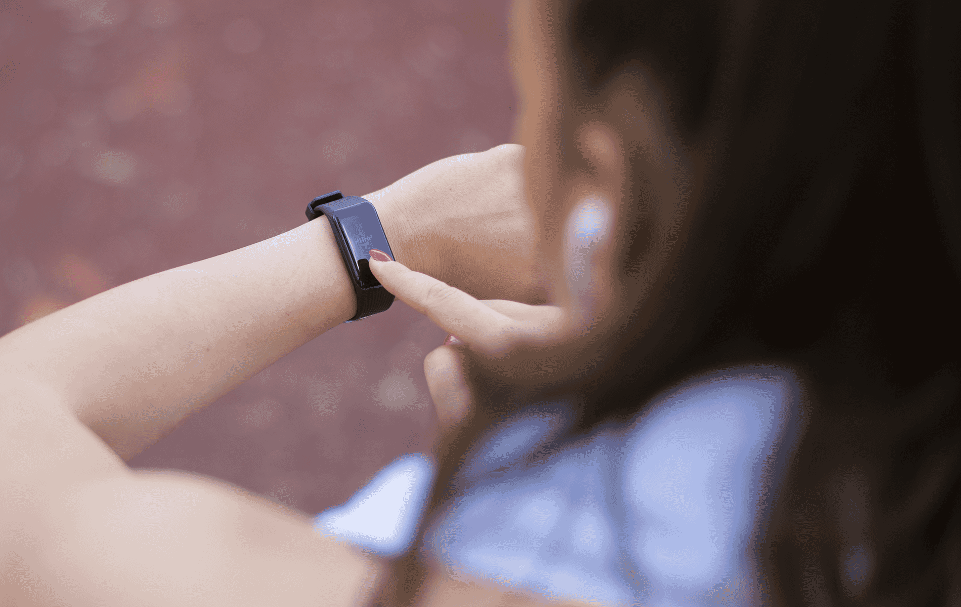 Image of someone checking their fitness tracker