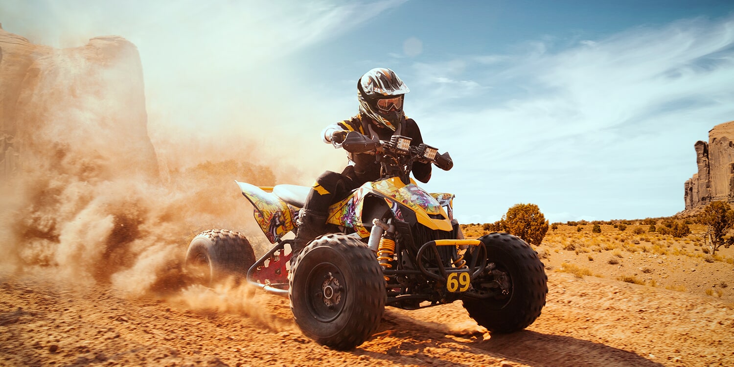 Person riding 4 Wheel ATV