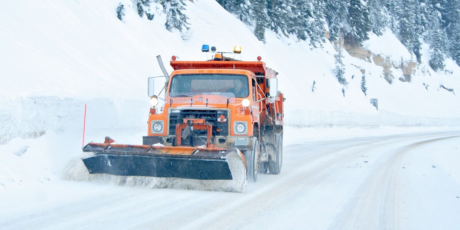 Snowplow pushing snow