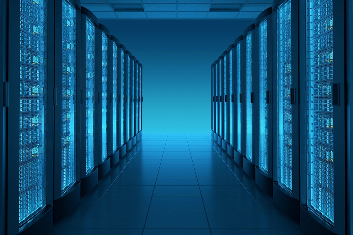 Modern data center with rows of blue-lit server racks