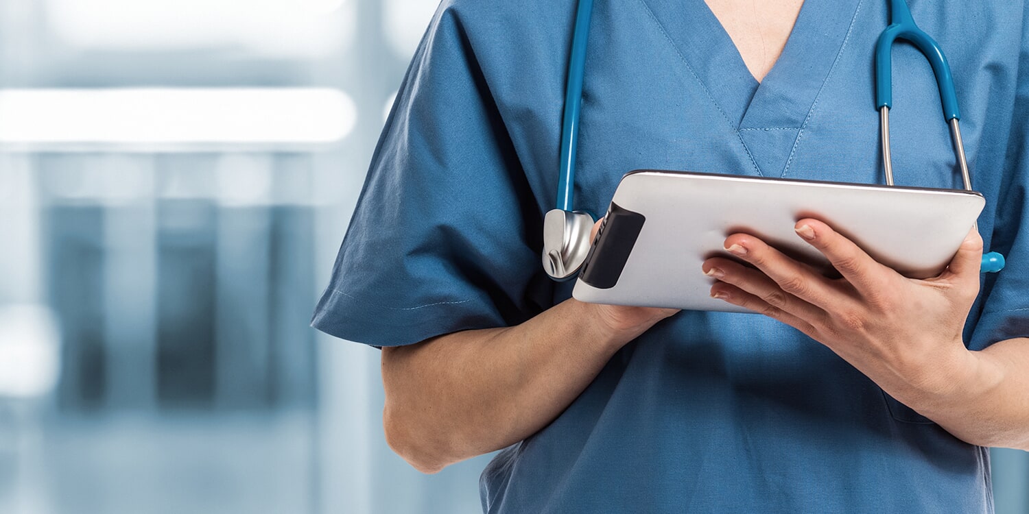 Doctor working on a tablet