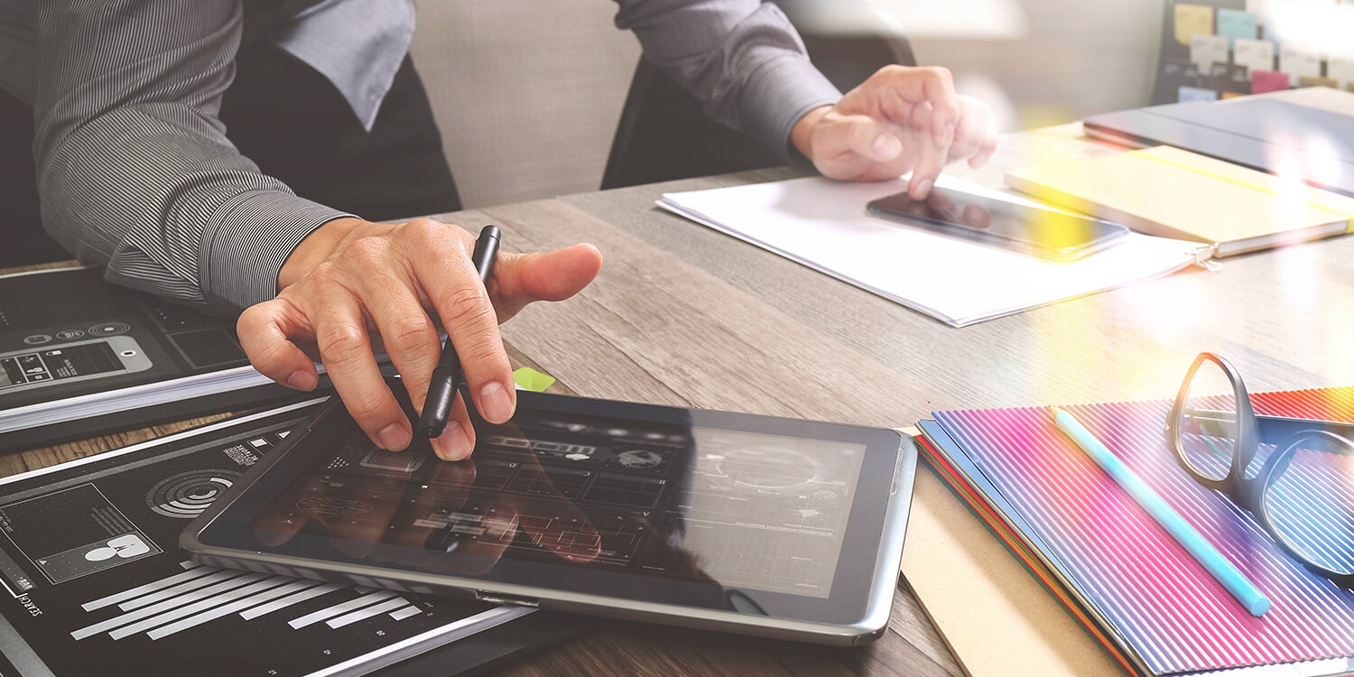 Photo of someone working on a tablet