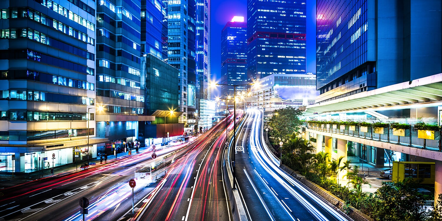 Photo of nightime traffic in a busy city